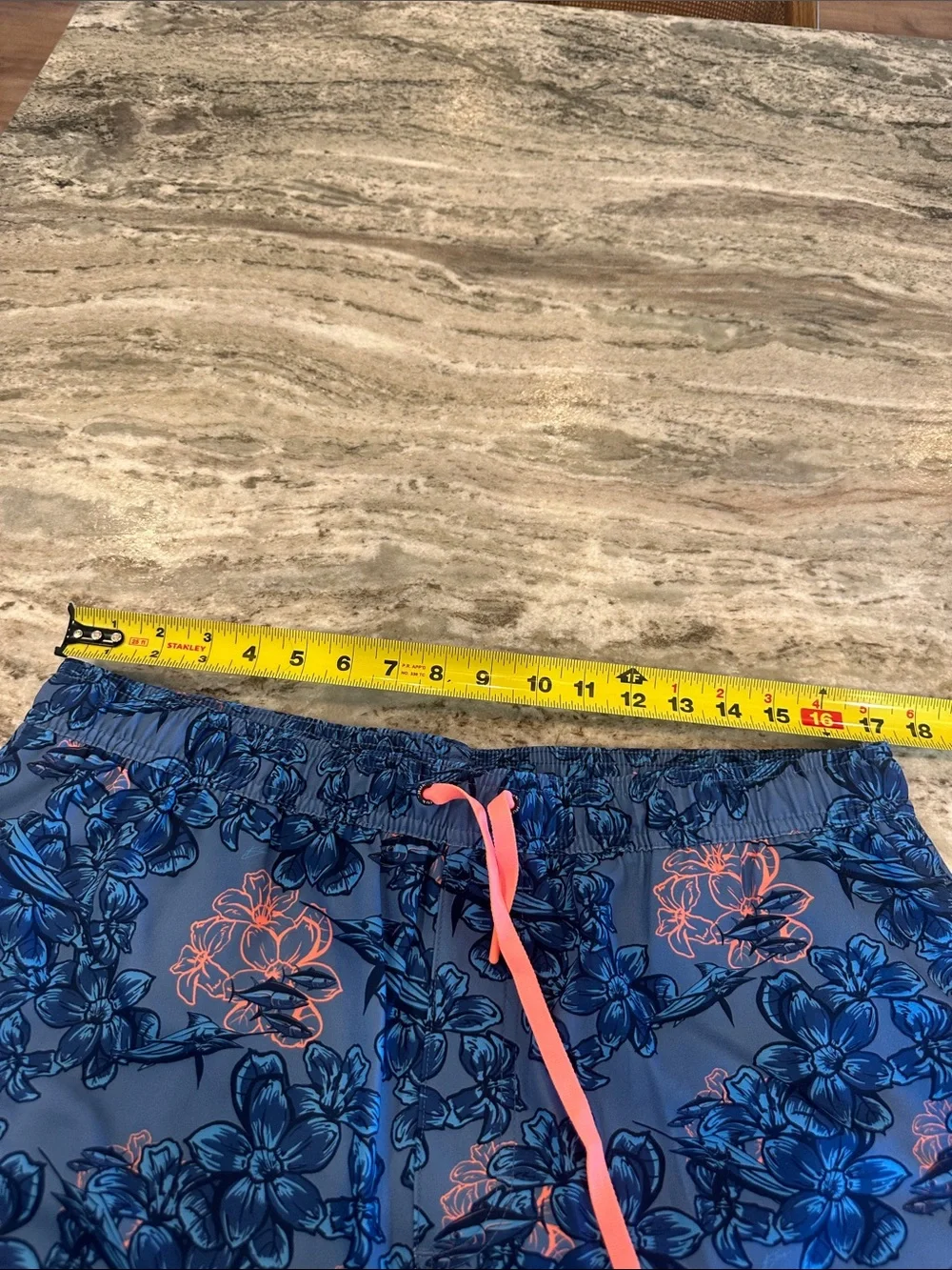 Huk Men’s Blue Floral Swim Trunks with Coral Drawstring